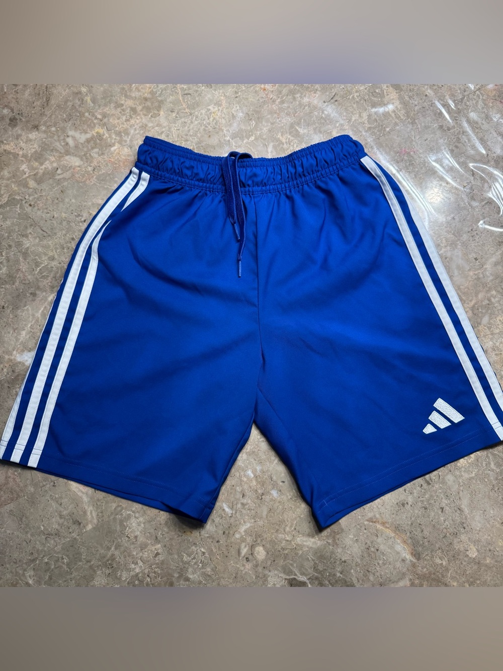 Adidas blue boys athletic shorts size 13/14
In great condition 
Stretchy waist